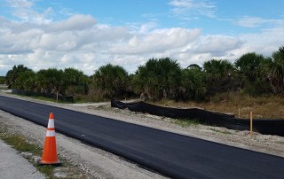 Construction of new paved bike trail at Honeymoon Island State Park in Dunedin, Florida