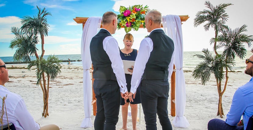 Same sex couple wedding on Honeymoon Island